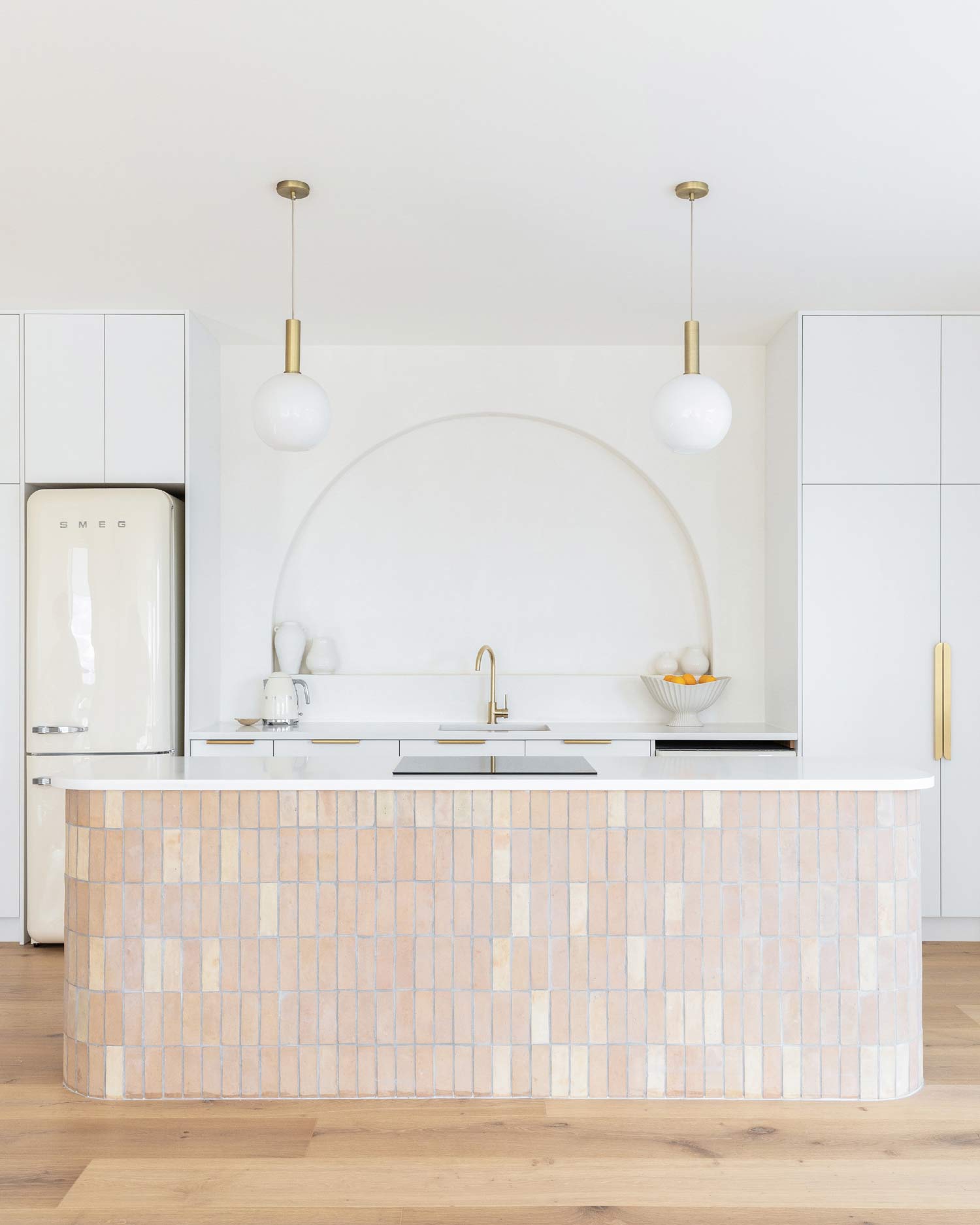 Kitchen-styling-ideas-for-a-moditerranean-home-inclue-brushed-brass-tapware-handmade-clay-tiles-niche-wall-and-a-neutral-colour-palette.jpg 